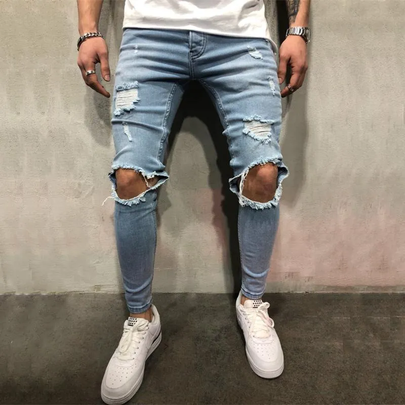 Blue Ripped Knee Out Skinny Jeans